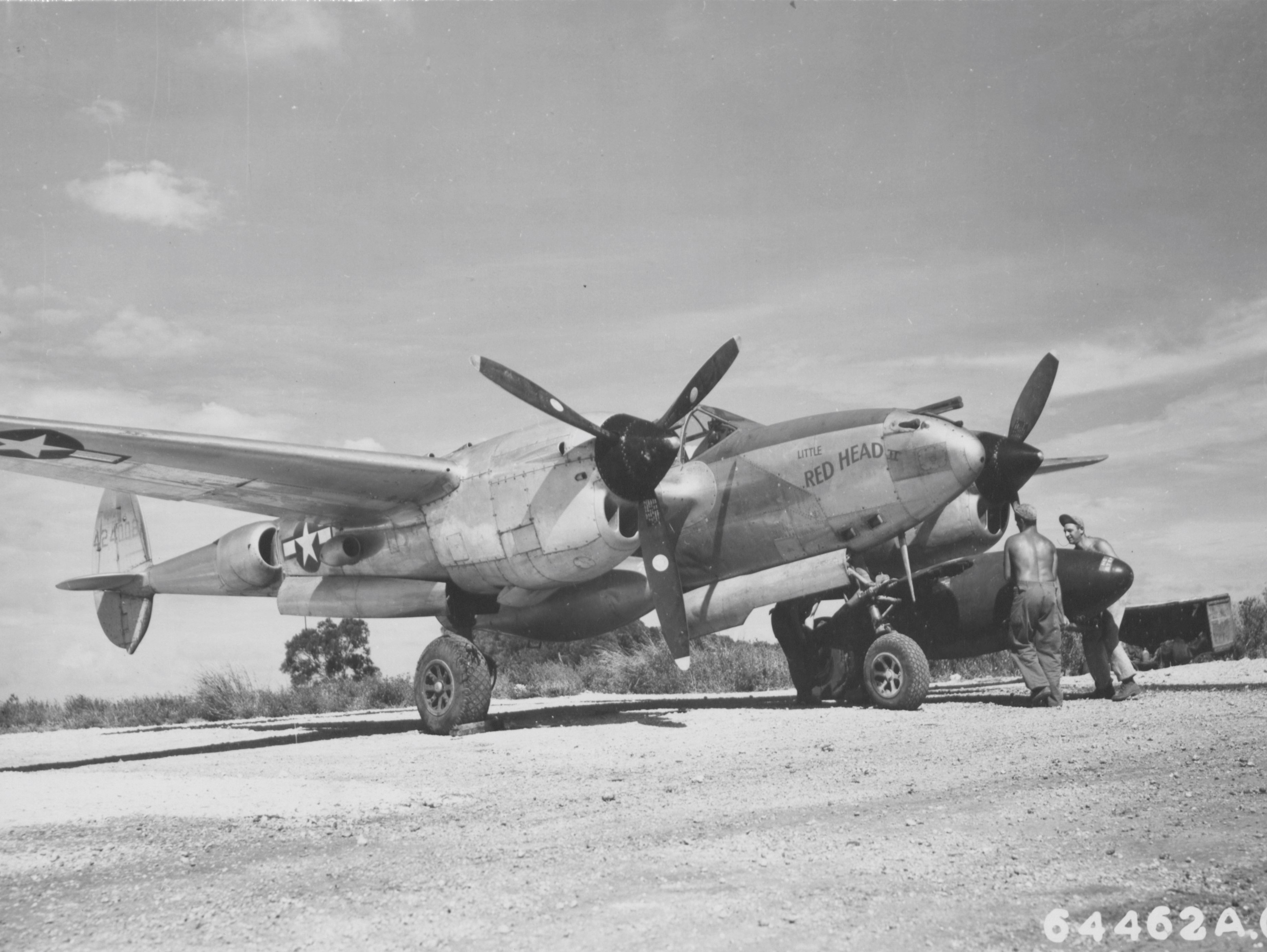 Loading wing tanks, Saipan