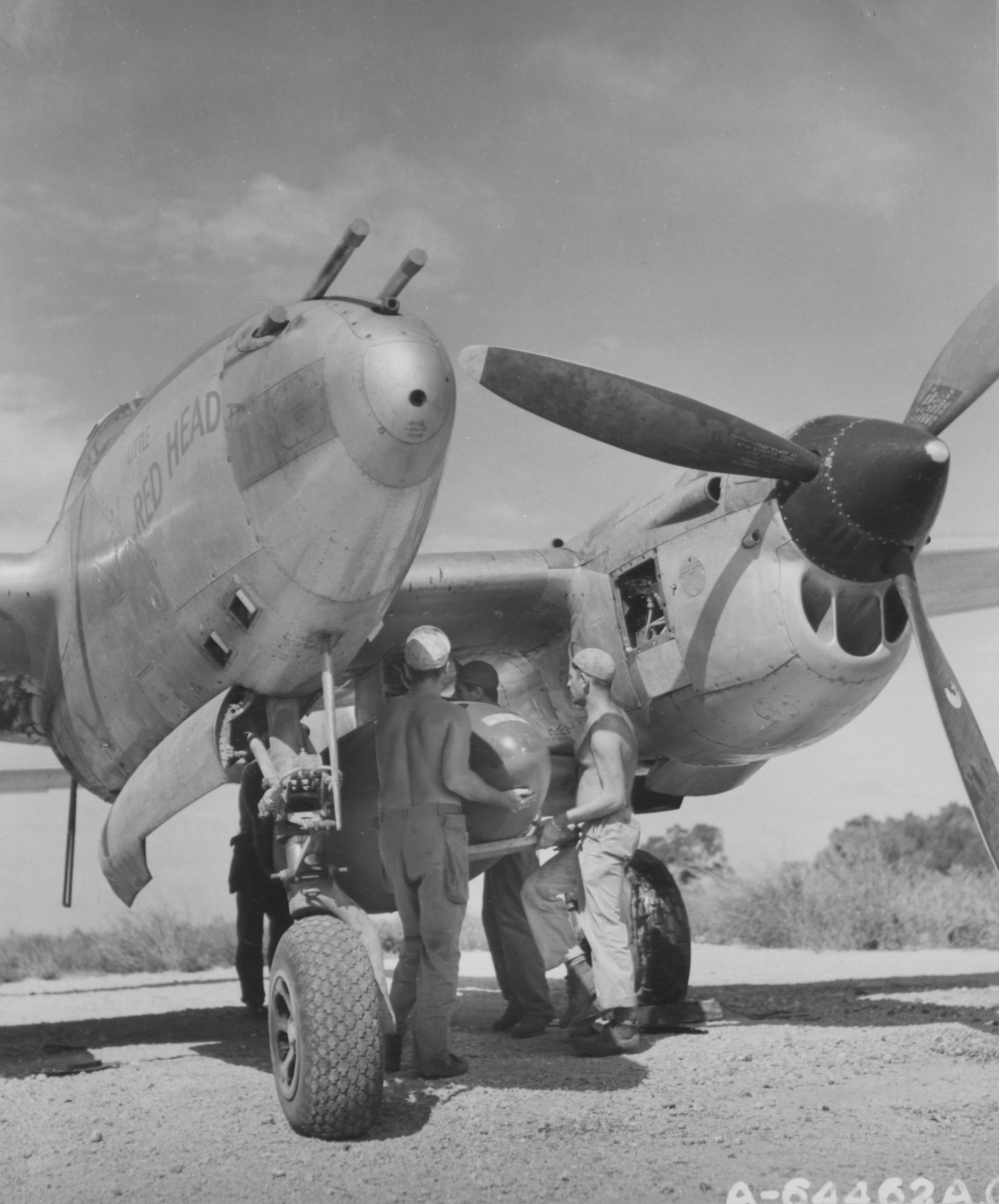 Loading wing tanks, Saipan