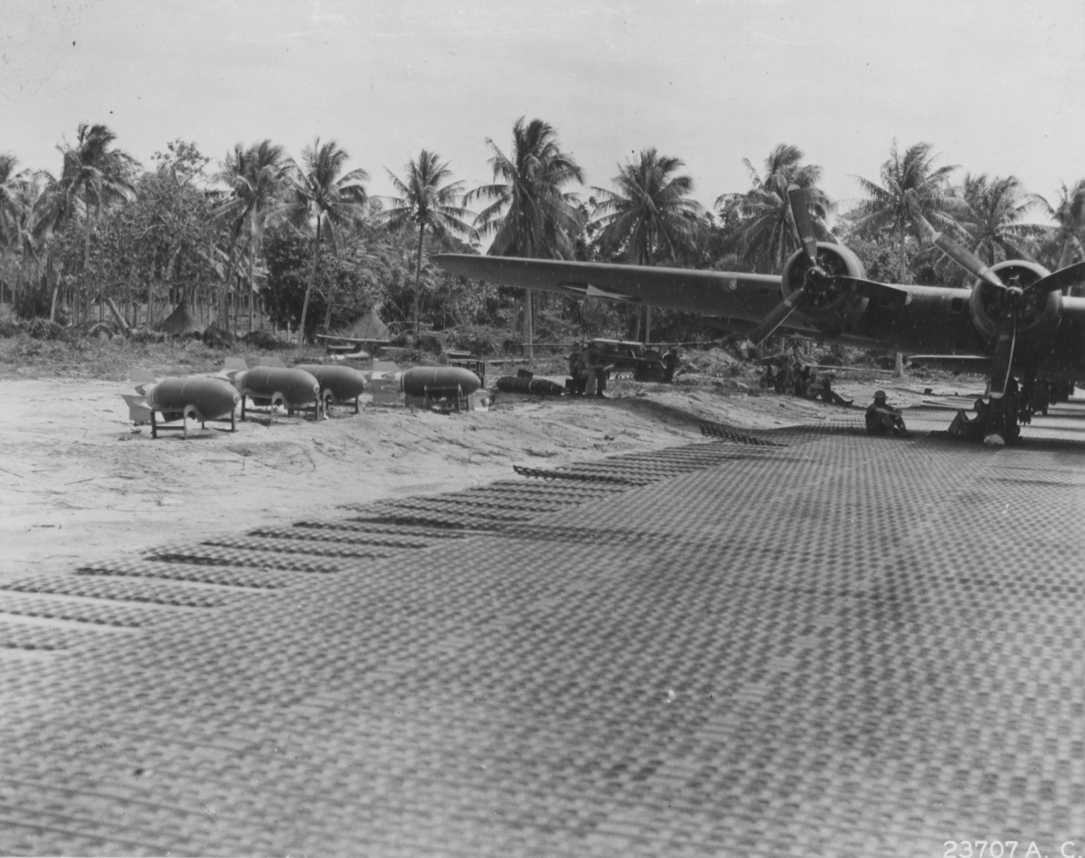 Bombs stand ready to be loaded aboard a B-17