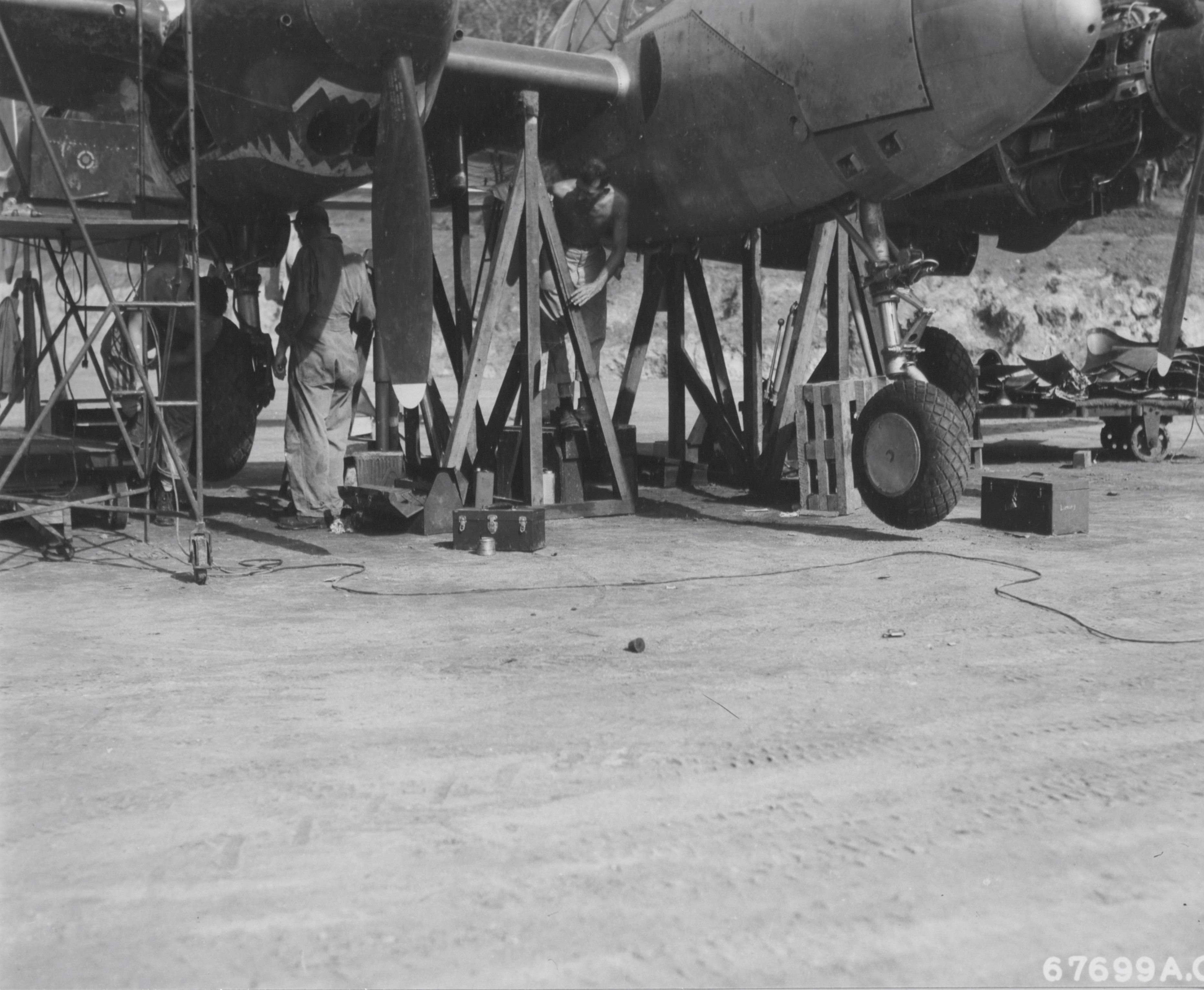 Repairs to a P-38, Port Moresby